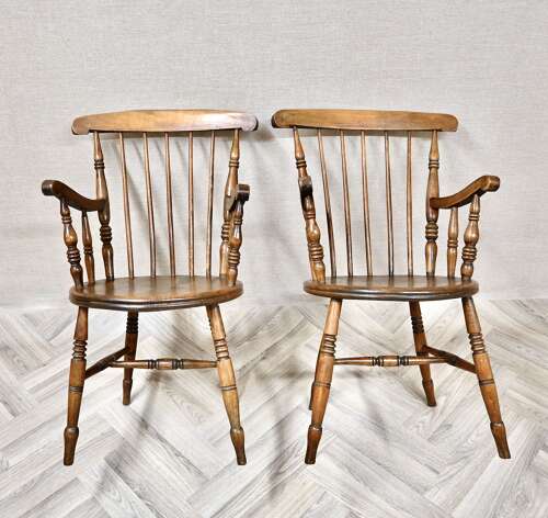 A Pair of Penny Seat Windsor Armchairs